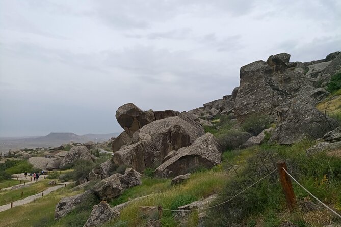 Baku: Gobustan, Mud Volcano, Fire Temple & Burning Mountain - Heydar Aliyev Cultural Center, the modern bookend
