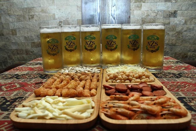 Baku Pub Experience ( All inclusive ) - Where You Start: Sabir Statue Meets Ismailiyyə Sarayı