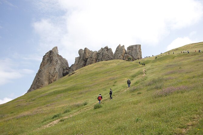 Beshbarmag mountain with sea view and Candy Mountains <em> Day Tour – Key things to know before you go’ /></p>
<ul>
<li><strong>Start at 9:00 am</strong> to catch Masazir when the lake often shows its pink look in the morning</li>
<li><strong>Small group, max 12</strong> keeps the pace manageable and makes it easier to hear your guide</li>
<li><strong>Free-entry stops early in the day</strong> include Masazir, Candy Cane Mountain, Beshbarmag Mountain, and the Heydar Mosque</li>
<li><strong>Weather can change fast at Beshbarmag</strong> since the mountain creates a split between rain and sun zones</li>
<li><strong>Heydar Aliyev Centre costs extra</strong> (not included), so decide whether you want that add-on</li>
<li><strong>Guides matter here</strong> and Samir, Sabina, Riyadh, Riad, and Fuad all get praised for being friendly and clear</li>
</ul>
<div class="twil" style="margin: 20px 0; padding: 15px 0;"><p>Beshbarmag and Pink Lake trips to compare:</p><ul style="margin: 10px 0; padding-left: 0; list-style: none;"><li style="margin: 0 0 12px 0; padding: 0 0 12px 0; border-bottom: 1px solid #eee; line-height: 1.4;"><a href="https://azerbaijan-guide.com/baku-candy-mountain-pink-lake-besh-barmag-dag-and-mosque/">Baku: Candy Mountain, Pink Lake, Besh Barmag Dag and Mosque</a><br><span style="font-size: 0.82em; color: #555;"><span style="color: #C0451A;">★</span> 4.6 · 273 reviews</span></li><li style="margin: 0 0 12px 0; padding: 0 0 12px 0; border-bottom: 1px solid #eee; line-height: 1.4;"><a href="https://azerbaijan-guide.com/khizi-shahdag-tour-lunch-included/">Khizi & Shahdag Tour (Lunch included)</a><br><span style="font-size: 0.82em; color: #555;"><span style="color: #C0451A;">★</span> 5.0 · 154 reviews</span></li><li style="margin: 0; padding: 0; border-bottom: none; line-height: 1.4;"><a href="https://azerbaijan-guide.com/khizi-shahdag-tour/">Khizi-Shahdag Tour</a><br><span style="font-size: 0.82em; color: #555;"><span style="color: #C0451A;">★</span> 5.0 · 80 reviews</span></li></ul></div><h2 id="setting-out-from-baku-at-900-with-pickup-and-an-easy-rhythm">Setting out from Baku at 9:00, with pickup and an easy rhythm</h2>
<p><img width="669" height="446" decoding="async" src=